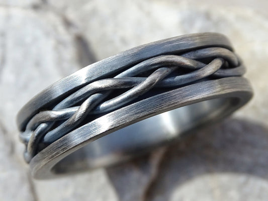 handmade black sterling silver braided wedding band with thick chunky hand-forged design