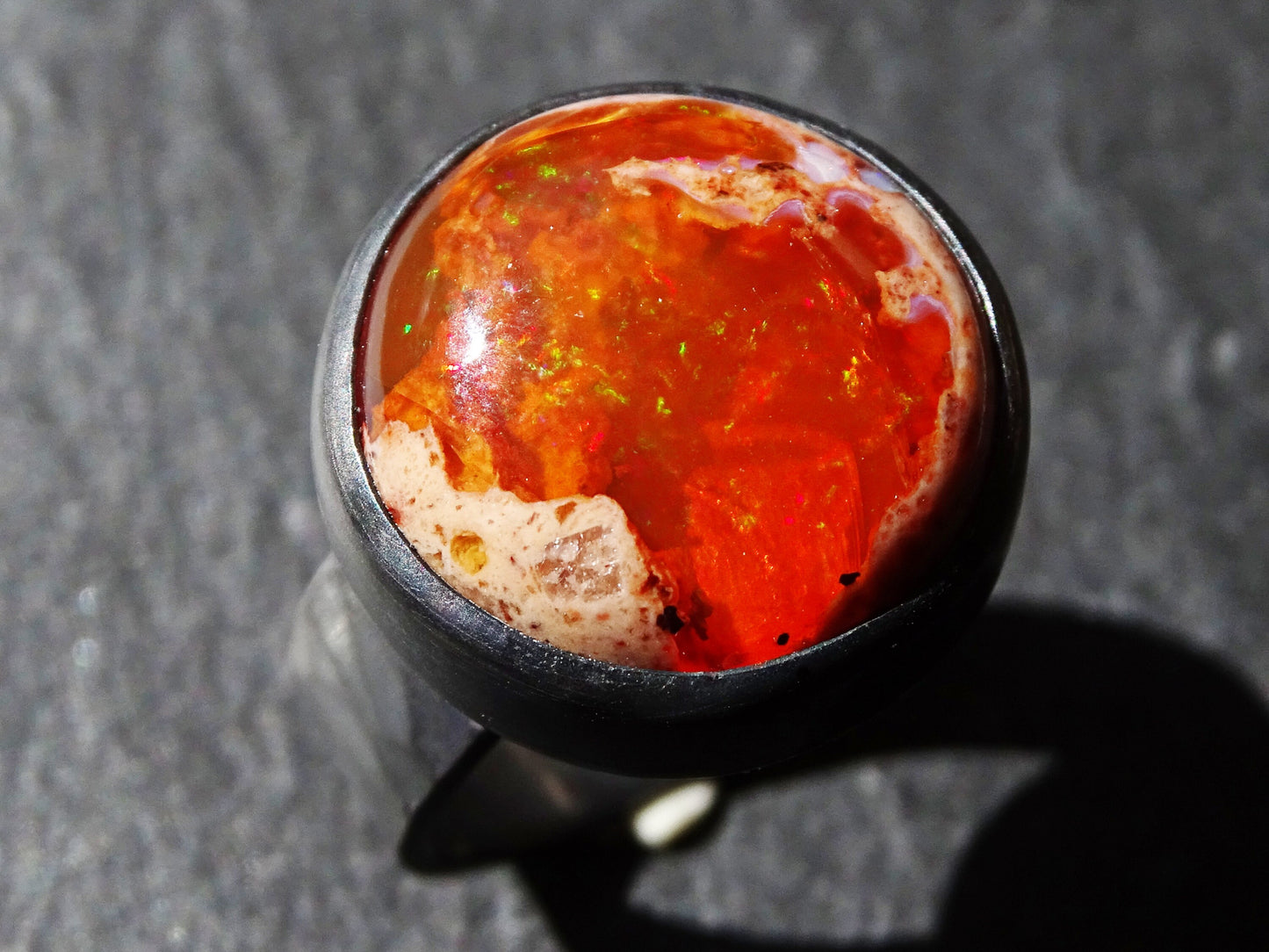 large orange fire opal ring in black silver, size US 7 1/4 - CrazyAss Jewelry Designs