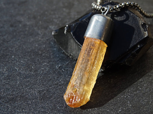 golden Imperial Topaz crystal pendant in black oxidized sterling silver setting with natural faceted crystal point