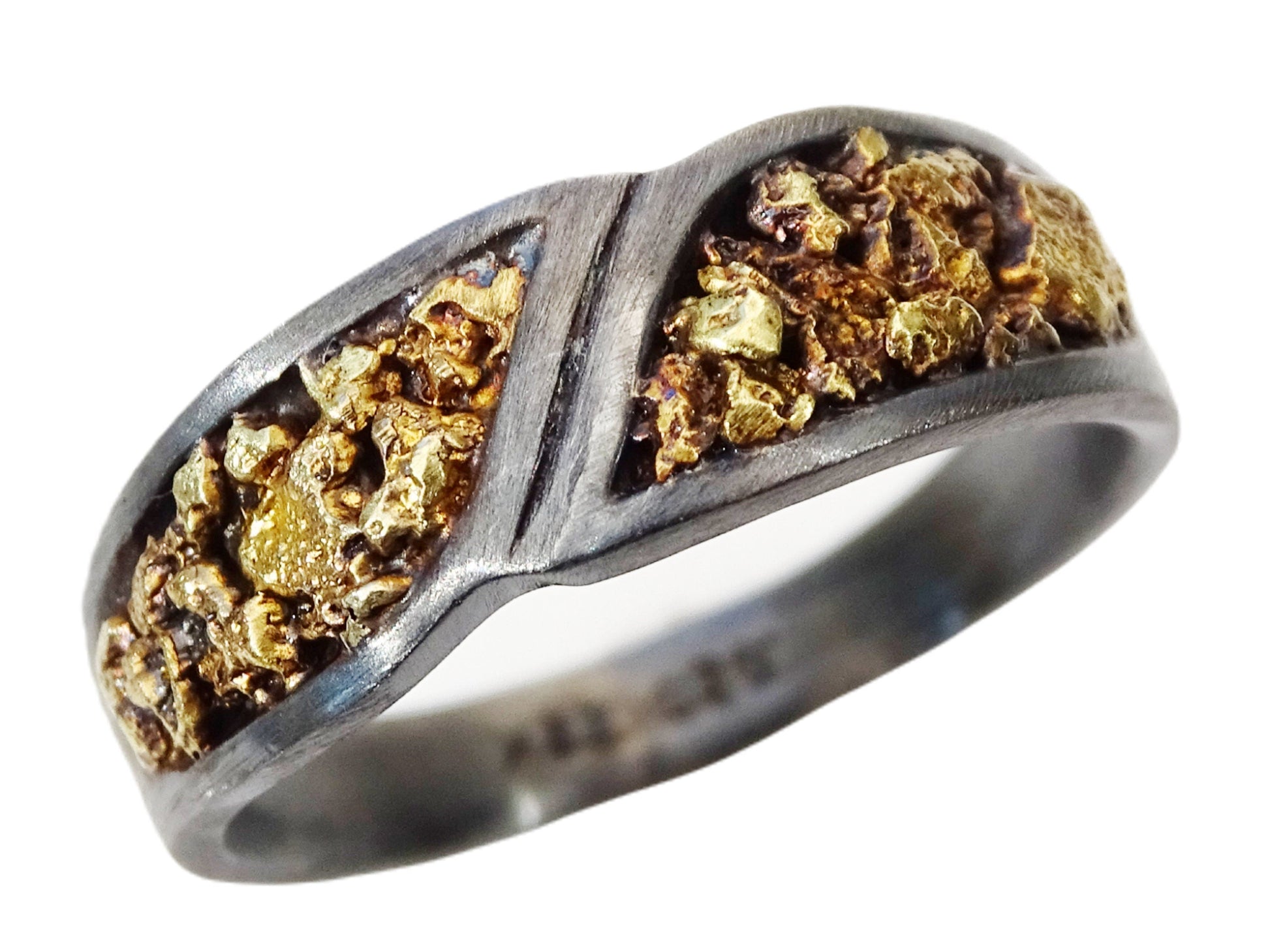 Black sterling silver band ring with natural Alaska gold nugget inlay