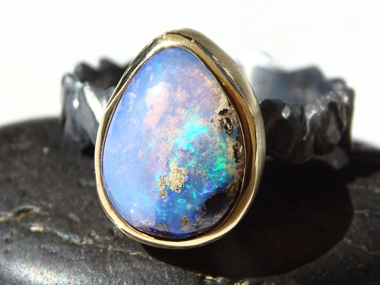 electric blue opal ring in 14k gold and black silver - CrazyAss Jewelry Designs