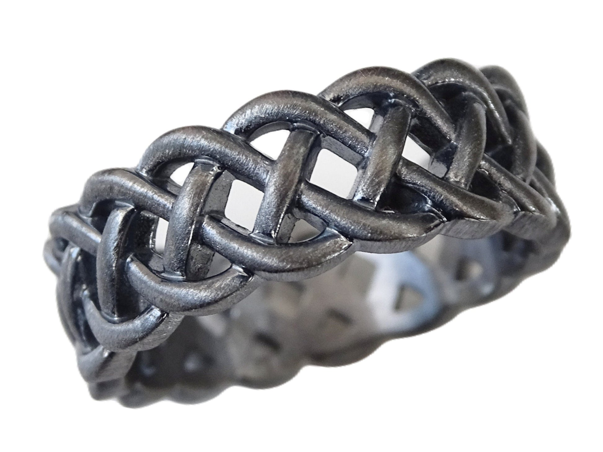 Minimalist braided style silver ring with a loose woven Celtic inspired design in black oxidized sterling silver.
