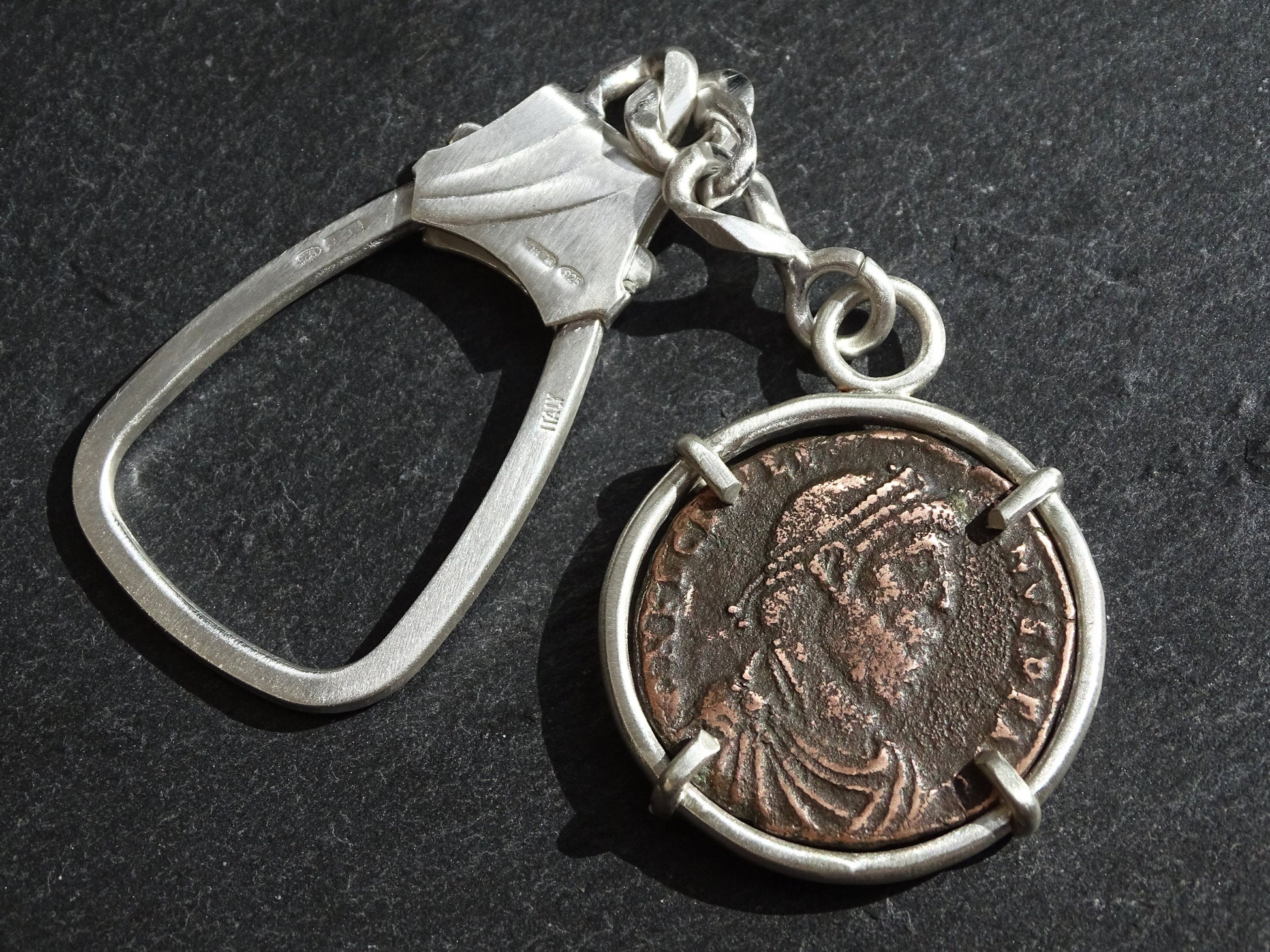 big silver key chain with ancient Roman Empire coin