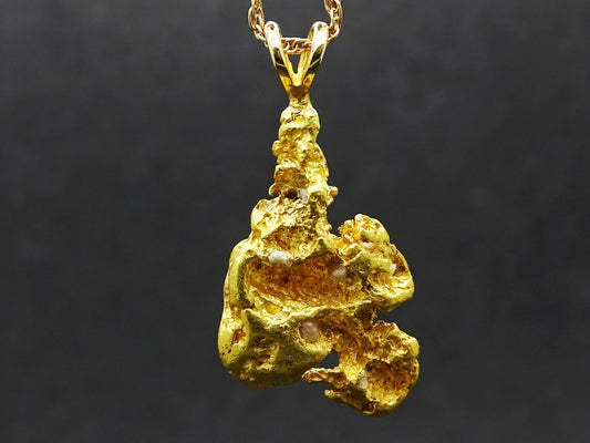 &gt; overall pendant hanging length is 35mm (1.37 inches) including the bail
&gt; all natural gold nugget, just as it was mined in Alaska &gt; statement size nugget 