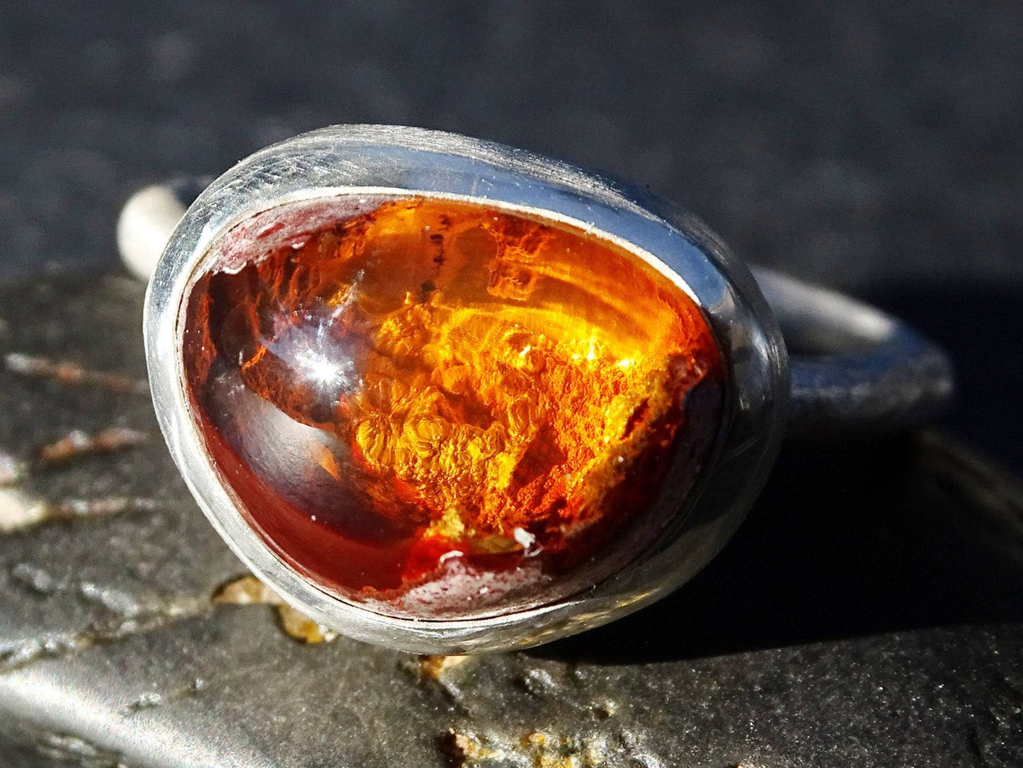 fire opal engagement ring with natural Mexican fire opal in sterling silver molten band