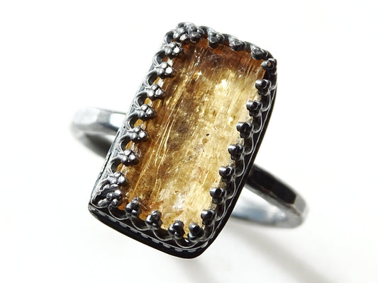 Imperial Topaz ring with uncut golden Topaz crystal set in dark silver sterling silver band