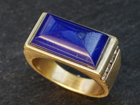 Large 14k gold lapis lazuli ring with channel set diamonds and a rectangular blue lapis lazuli centerpiece