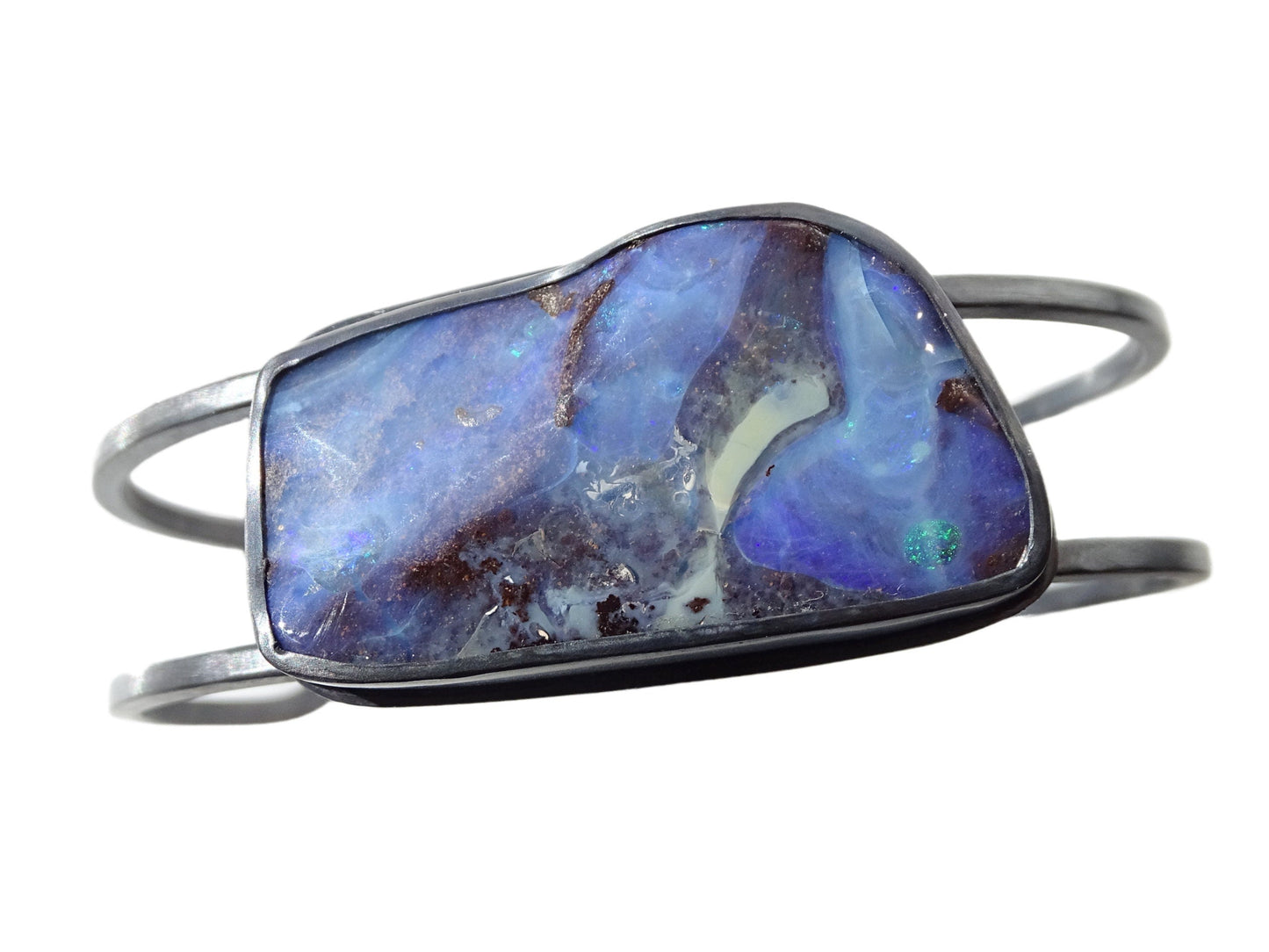Black sterling silver cuff bracelet with large blue Australian boulder opal gemstone centerpiece