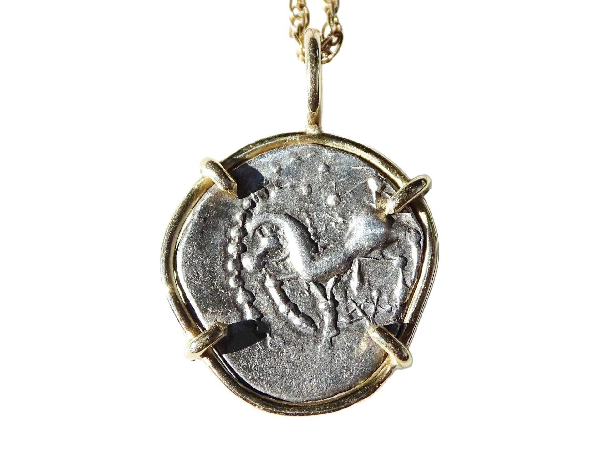 Bituriges Cubi Celtic silver coin pendant in 14k gold with prancing horse design and antique patina