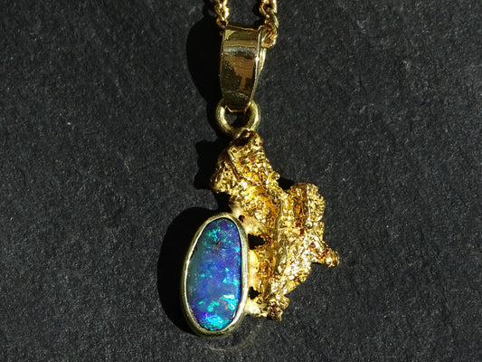 Alaska gold nugget pendant, adorned with a blue and green Australian opal gemstone. Stunning gift for all lovers of Nature's creations and the Great Outdoors, as wel