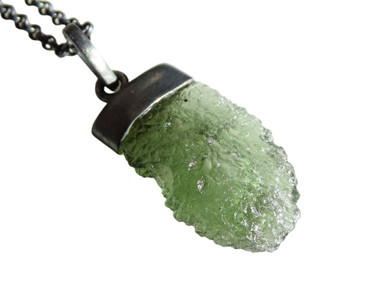 Raw green Moldavite crystal pendant set in black sterling silver with chain