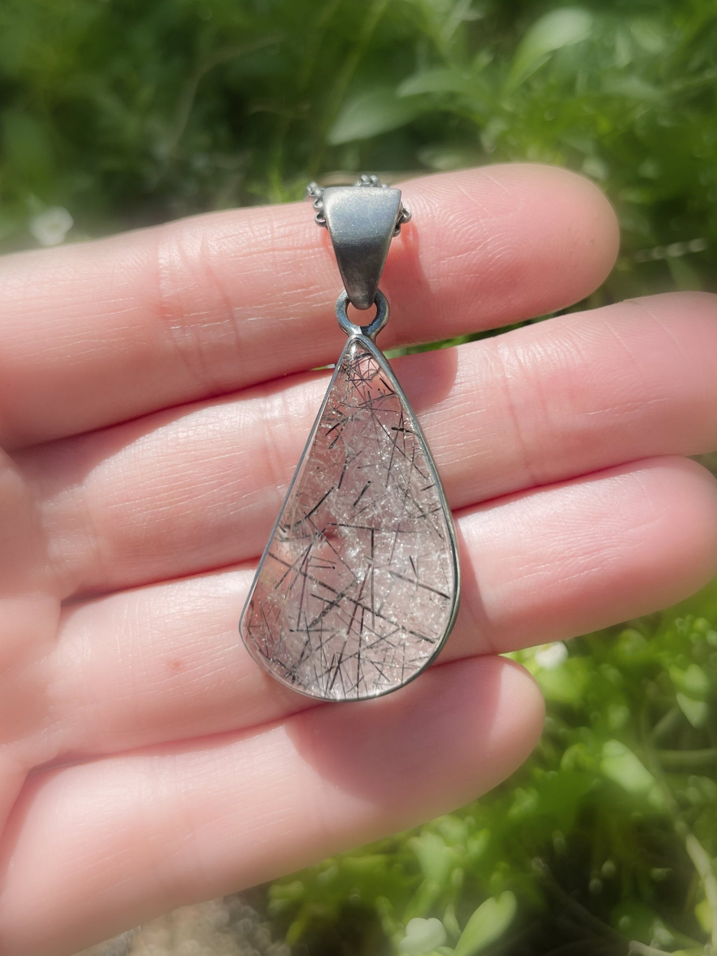 tourmaline in quartz pendant