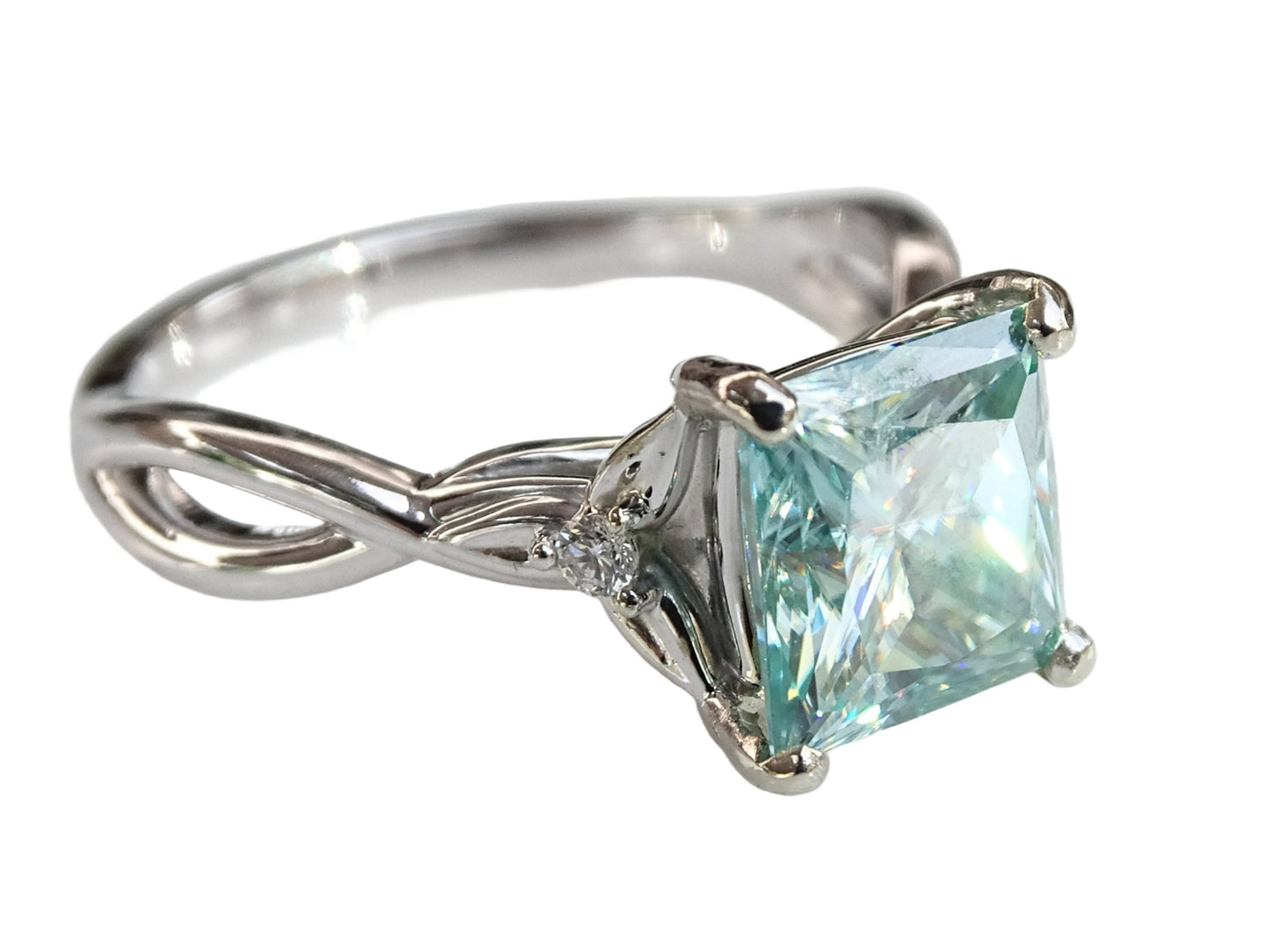 Minimalist 14k white gold ring with a large princess cut blue diamond. Unique engagement ring, and perfect to be worn every day. Wear it alone or stacked with other