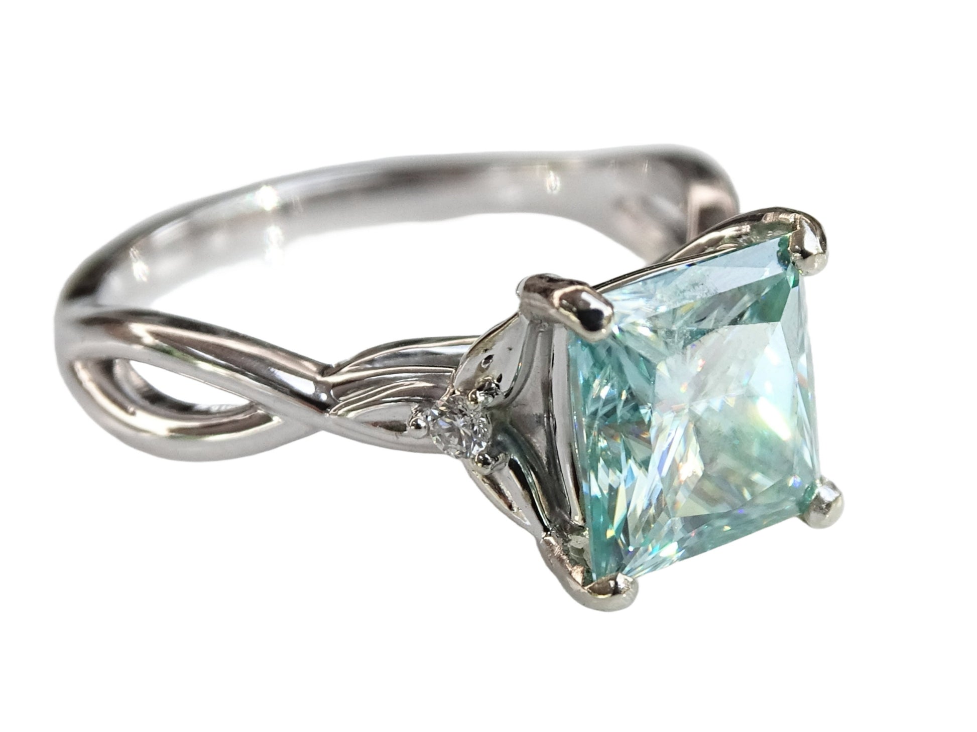 Minimalist 14k white gold ring with a large princess cut blue diamond. Unique engagement ring, and perfect to be worn every day. Wear it alone or stacked with other