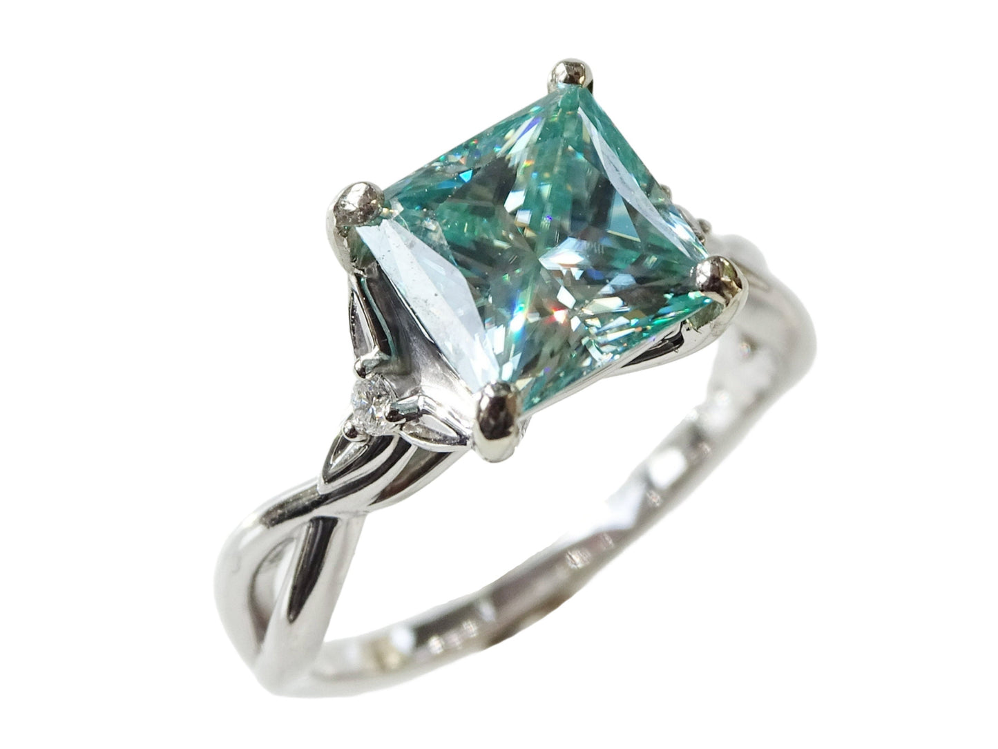 14k white gold engagement ring with 2 carat princess cut blue diamond and two small side diamonds