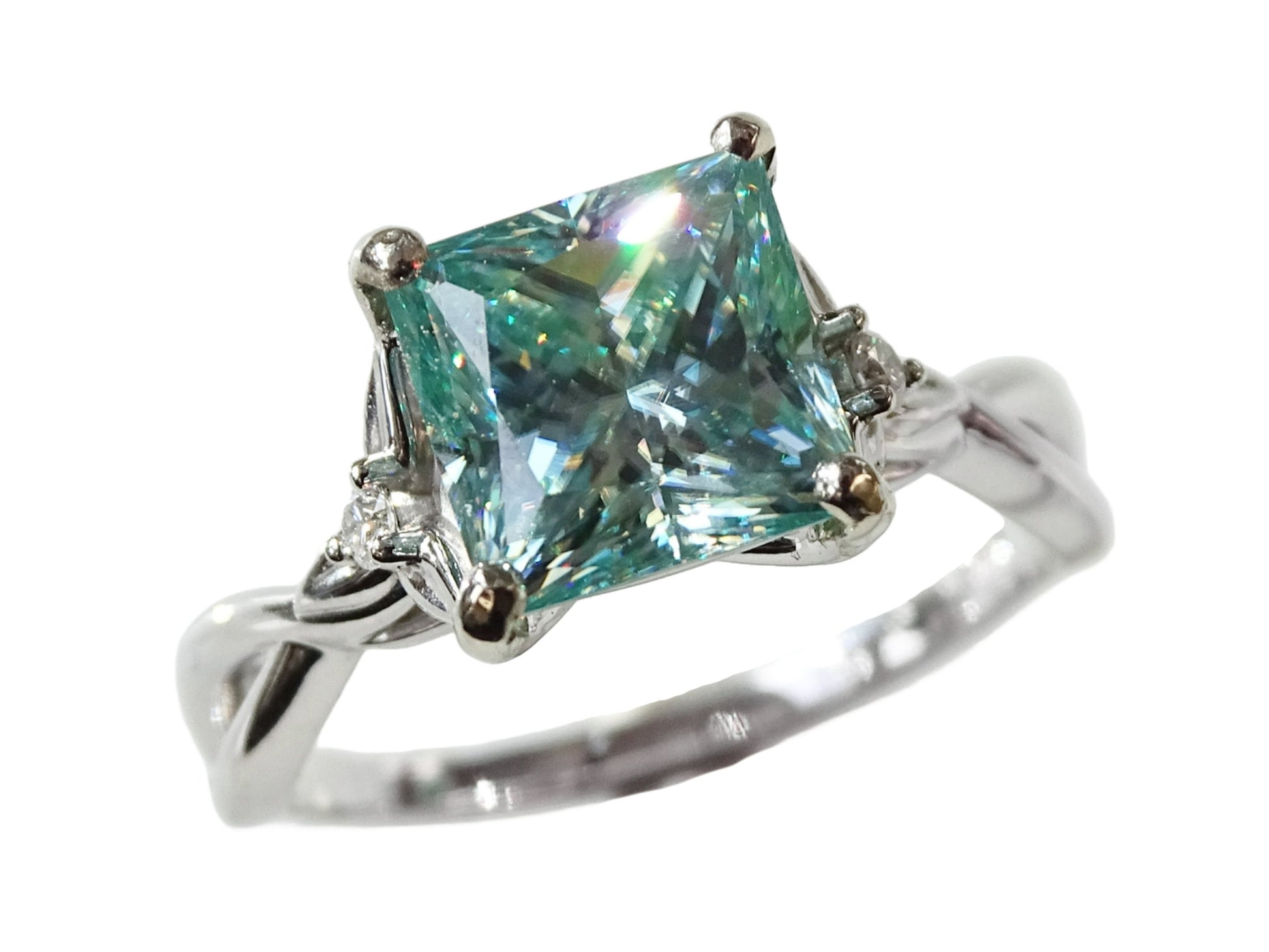 Minimalist 14k white gold ring with a large princess cut blue diamond. Unique engagement ring, and perfect to be worn every day. Wear it alone or stacked with other