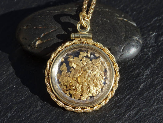Gold nugget locket pendant with all natural Alaska gold nuggets in a gold-filled rope wire setting on a gold-filled chain