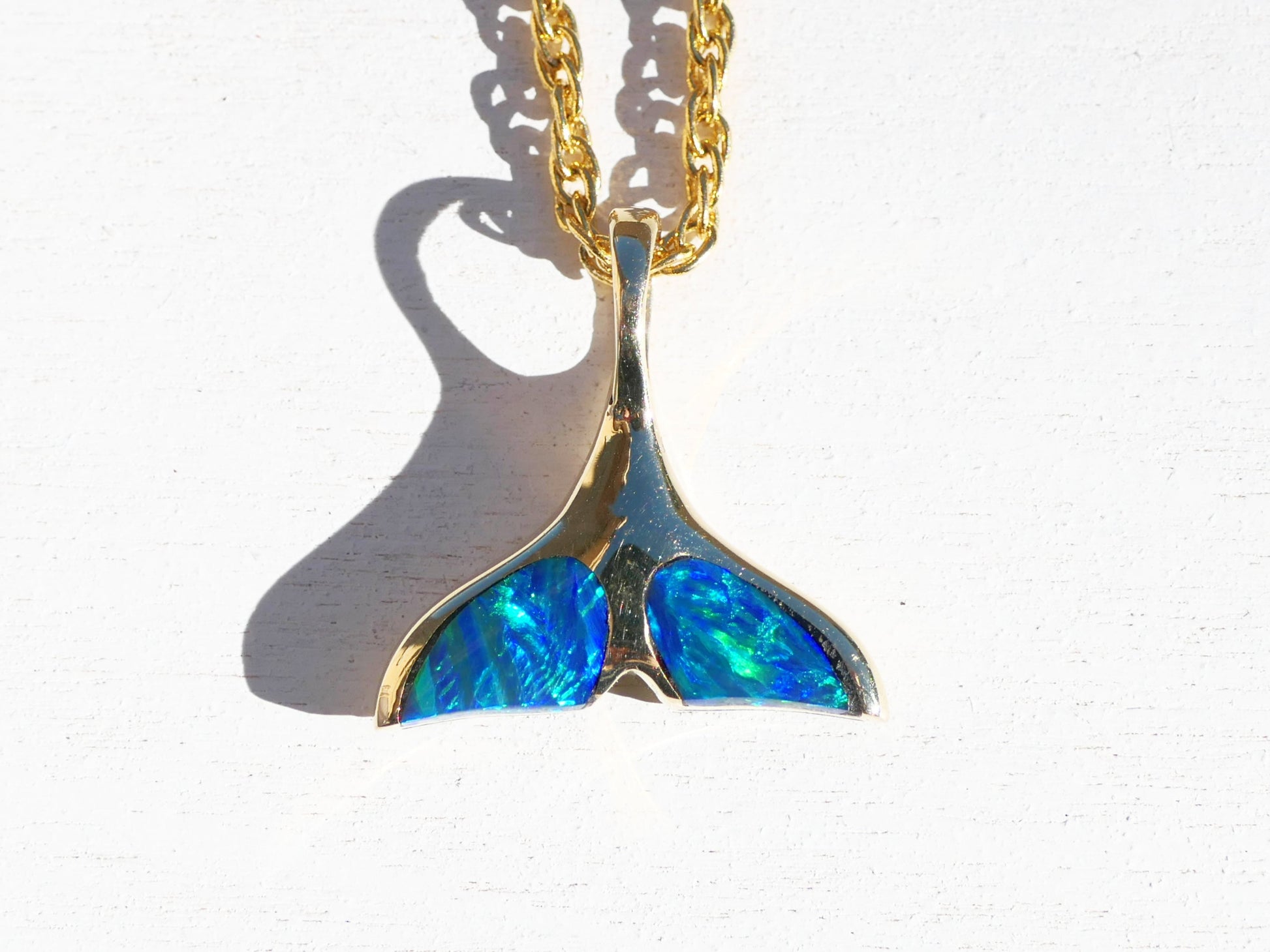 Australian opals gold whale tail pendant