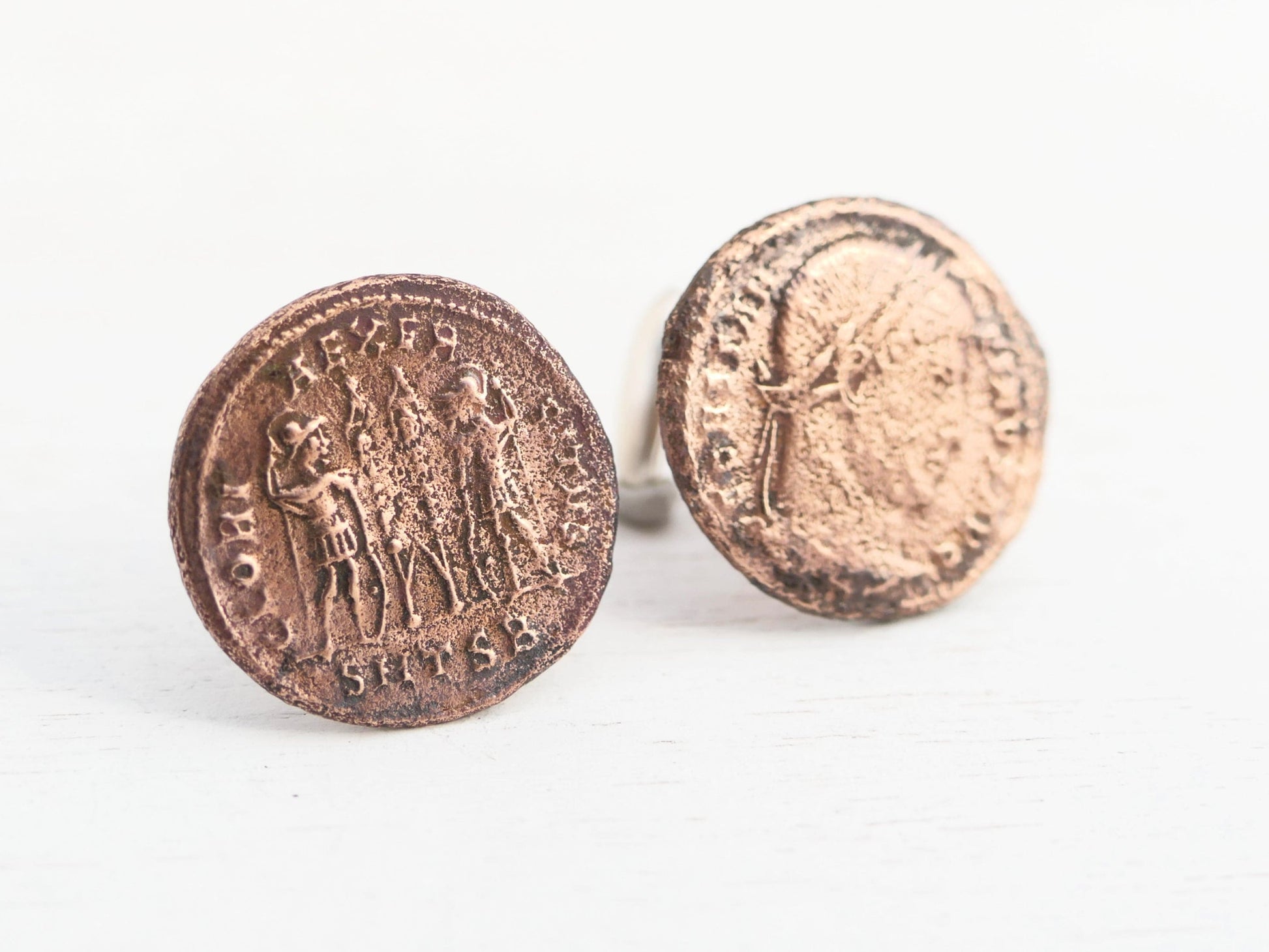 Ancient Roman coin cufflinks with bronze Emperor Constantine coins on sterling silver bases in a jewelry box