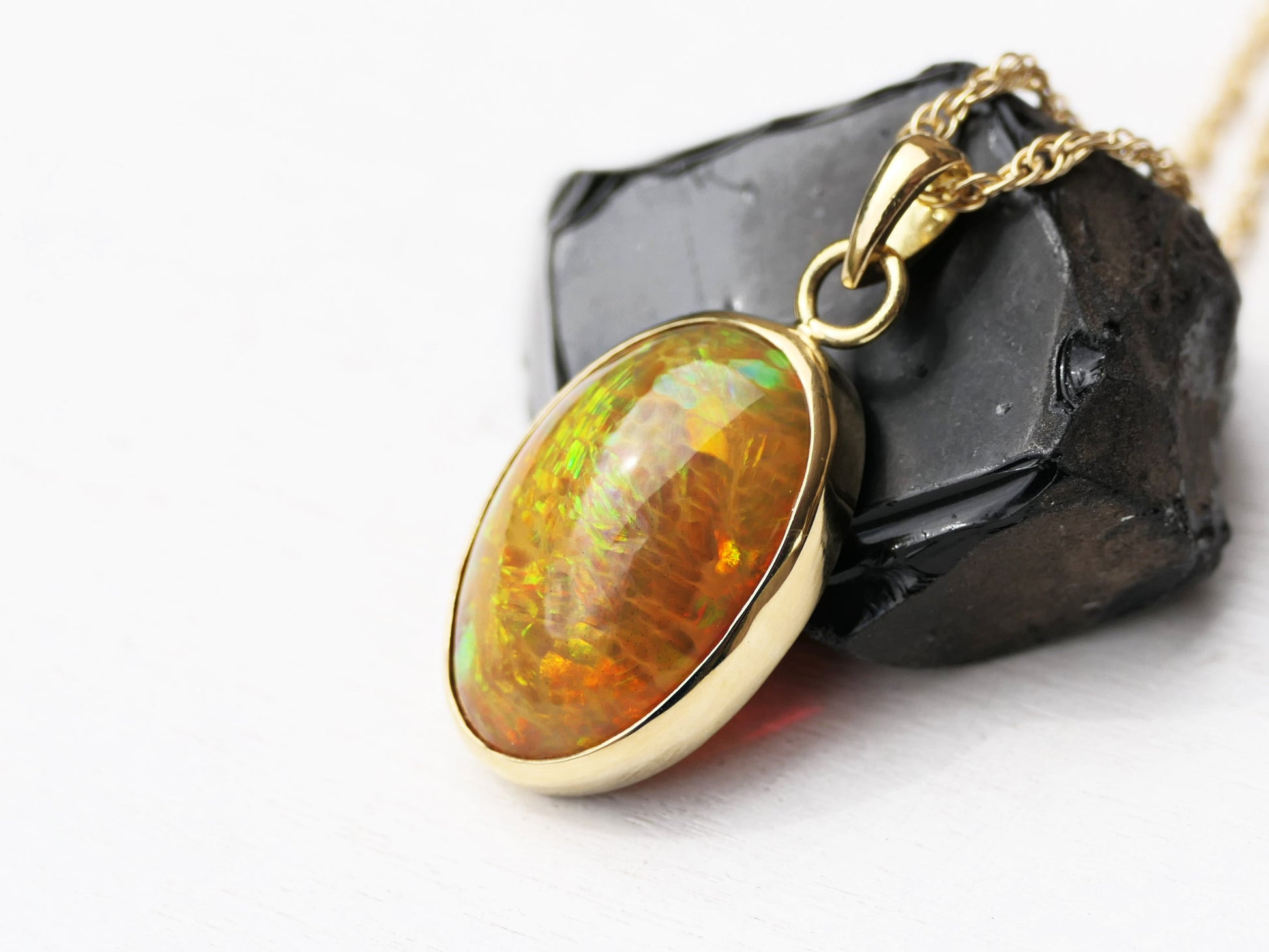 honeycomb welo opal charm pendant