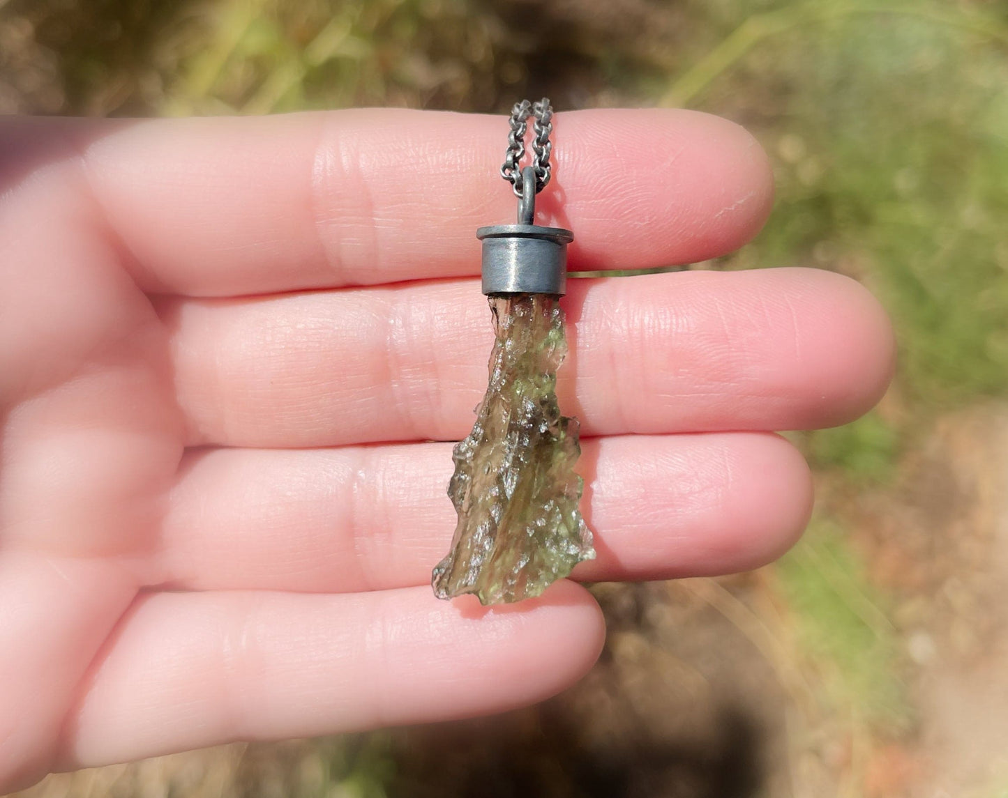 dark silver moldavite pendant