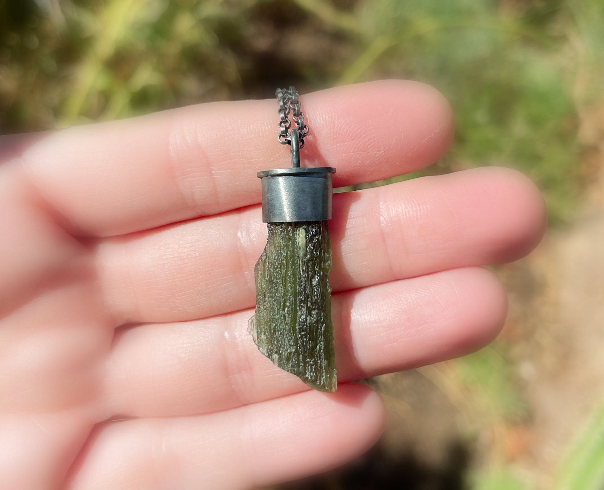 silver moldavite pendant