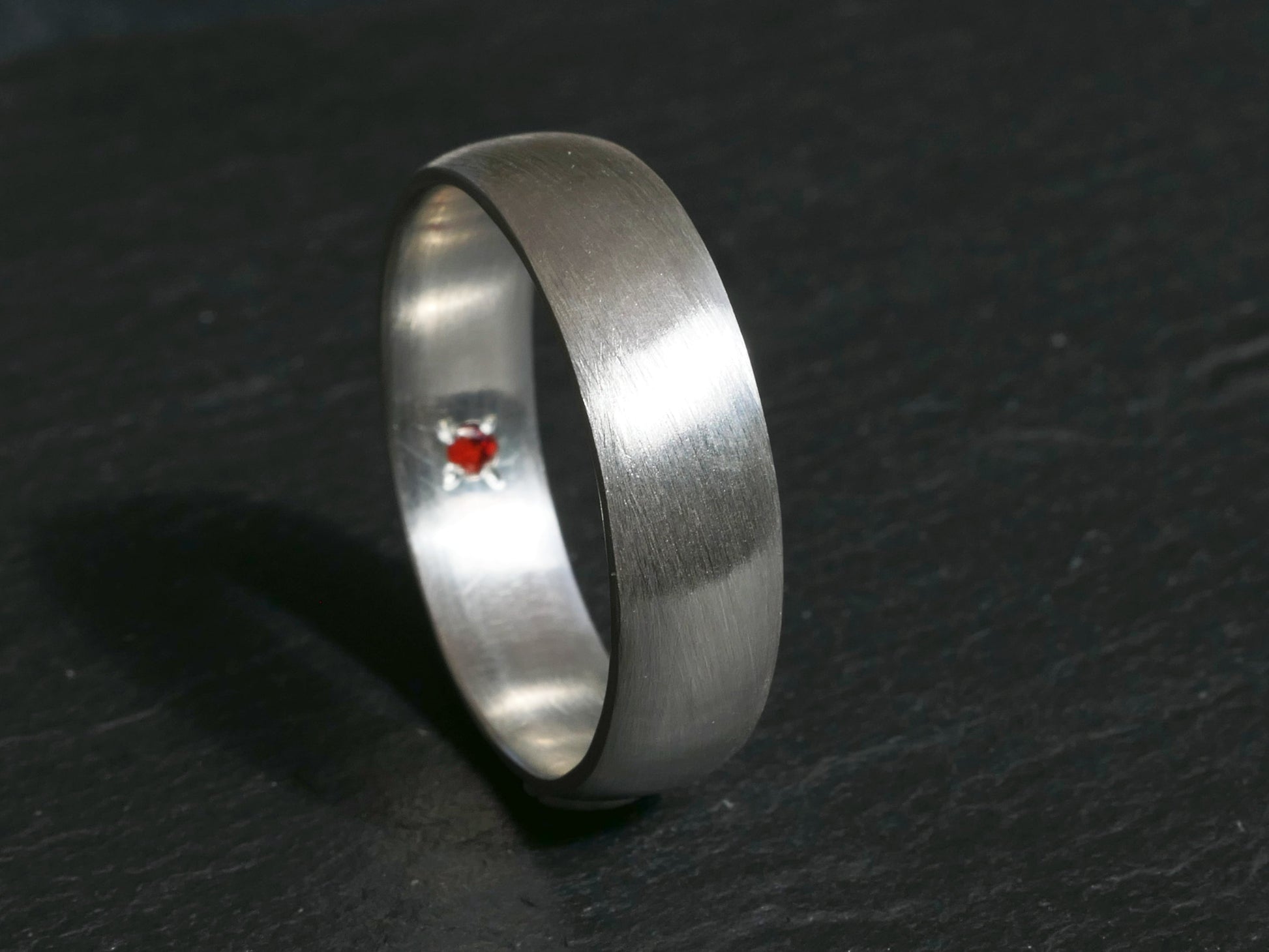 hidden gemstone ring sterling silver with a gemstone set on the inside of the band