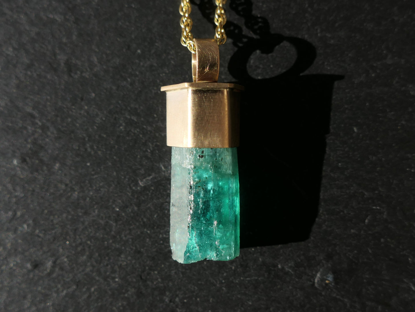 Emerald crystal set in 14K gold