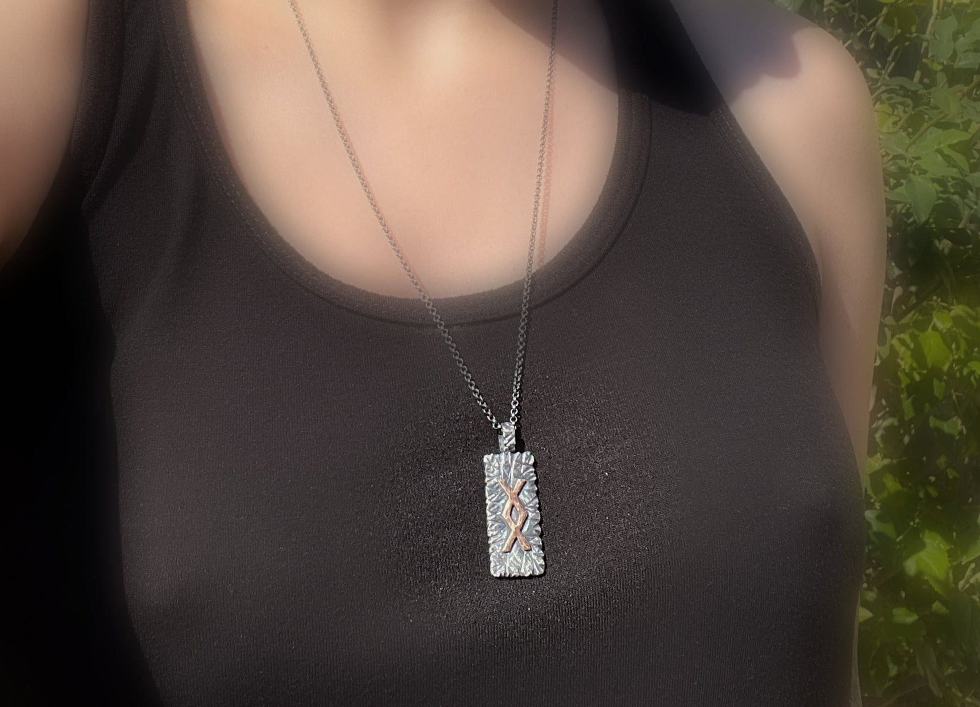 bronze rune pendant