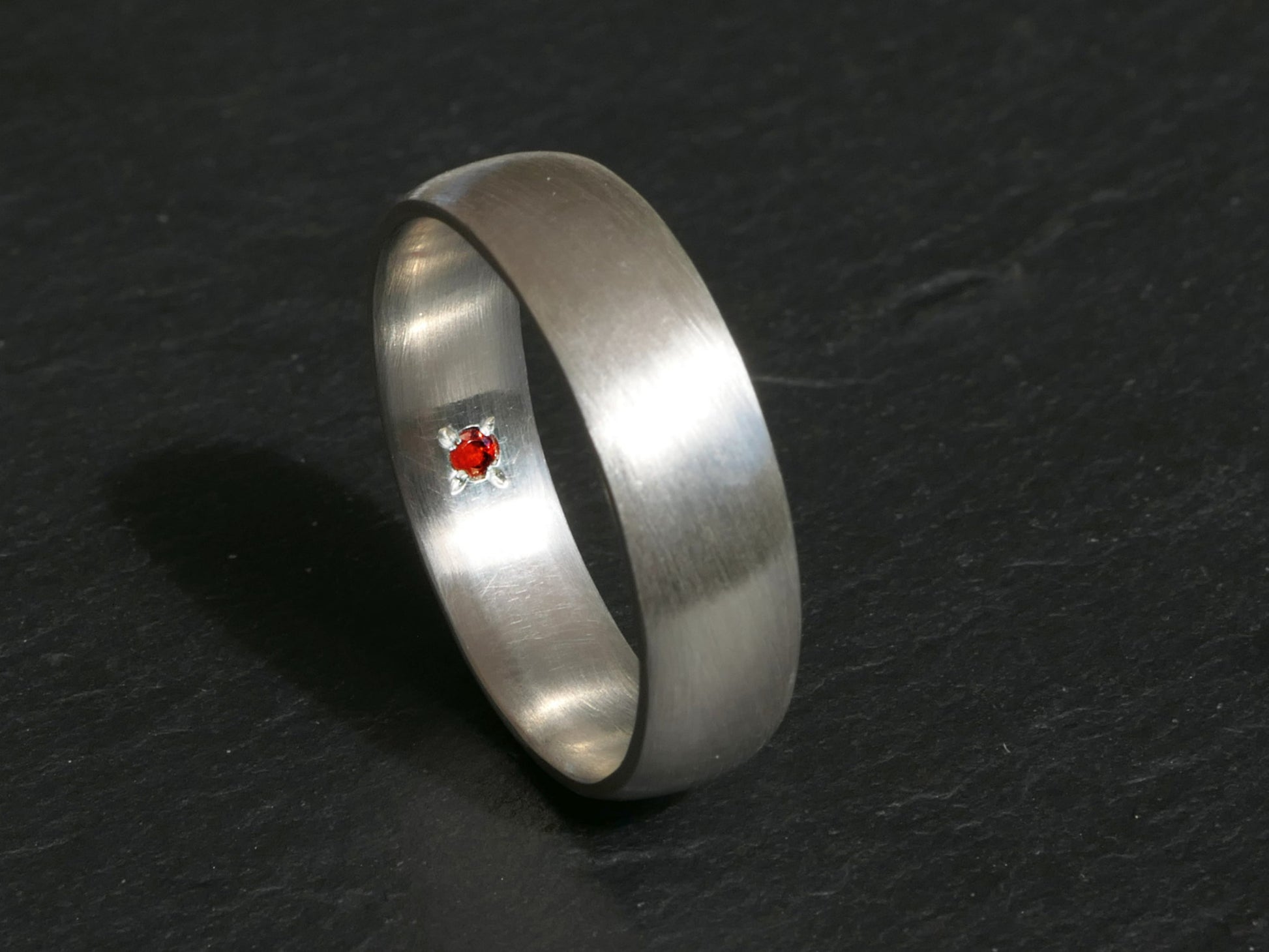 hidden gemstone ring inside gemstone band