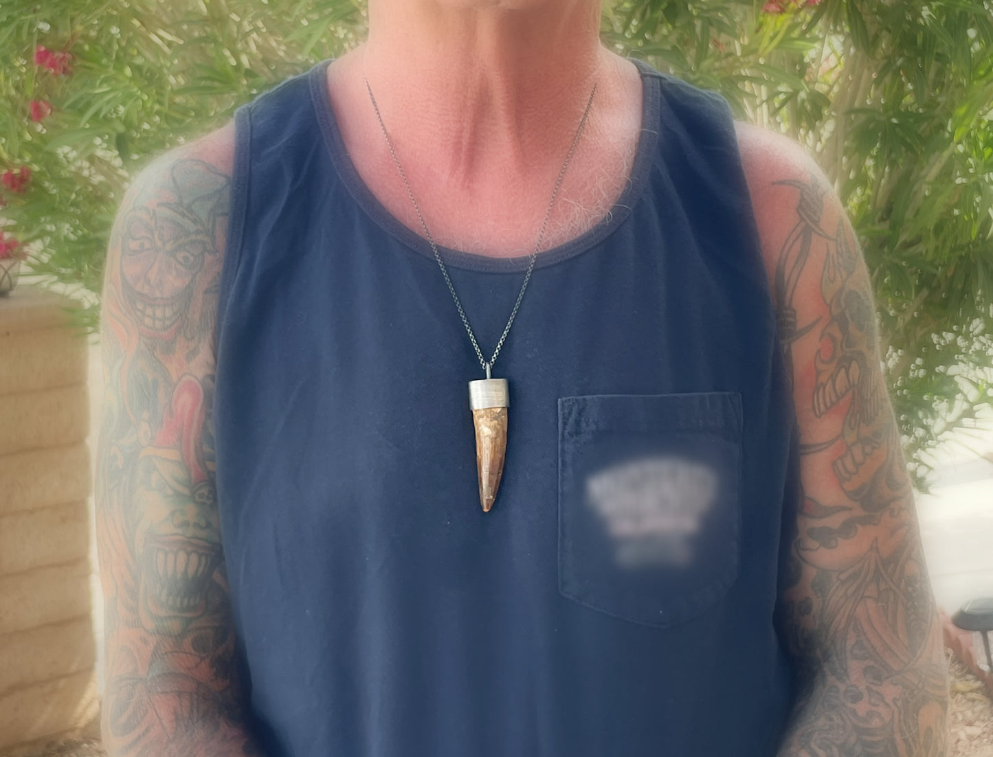 Spinosaurus dinosaur tooth necklace