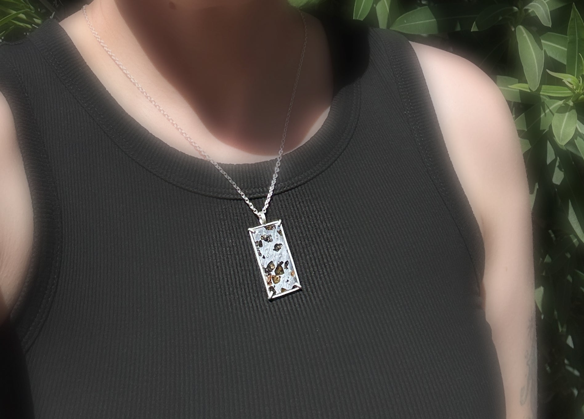 Sterling silver Pallasite meteorite pendant with diamond accents and Seymchan meteorite slice necklace