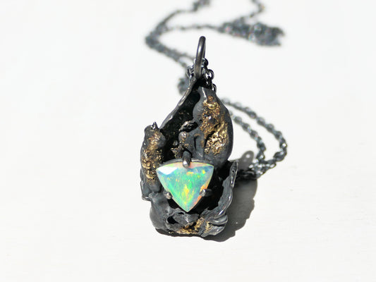 Watercast opal pendant with Ethiopian opal in blackened silver and 18K gold dust, October birthstone jewelry.