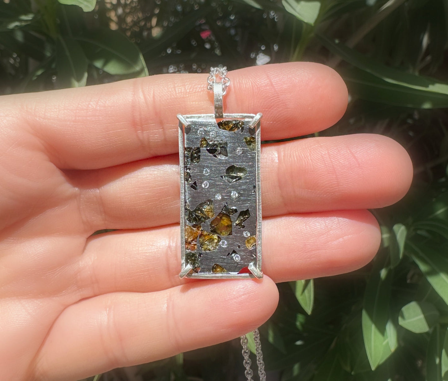 Pallasite meteorite pendant with diamond accents set in sterling silver Seymchan necklace