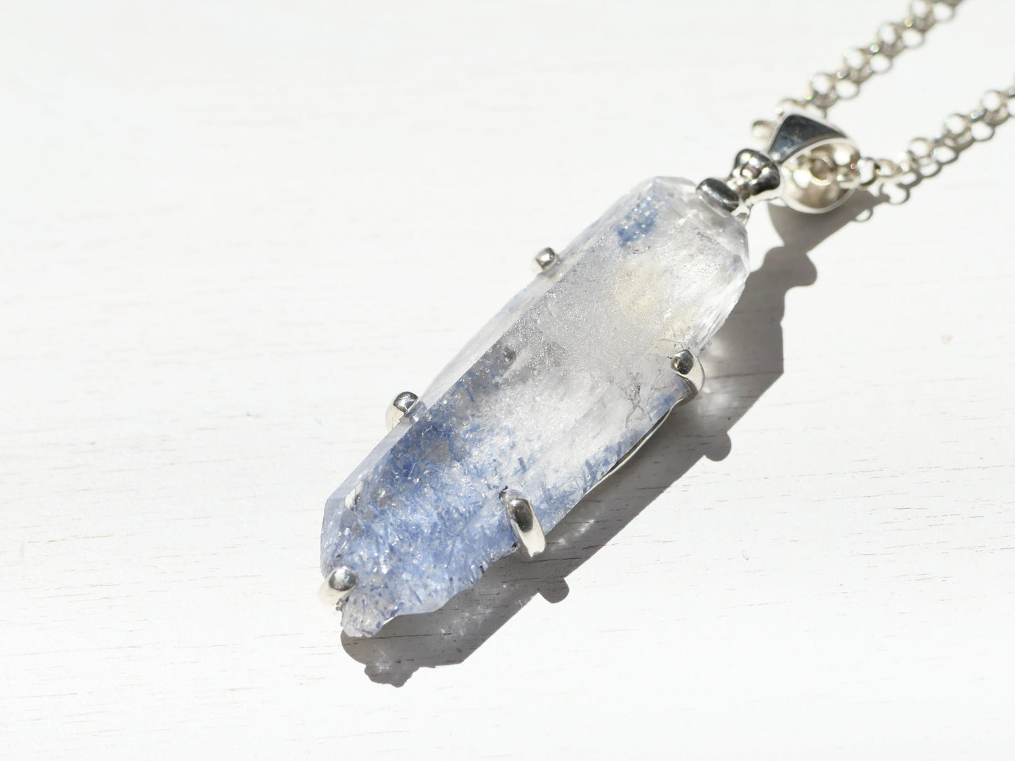 large dumortierite in quartz crystal