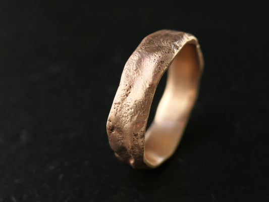 Handmade molten bronze ring with rustic steampunk design and unique textured surface