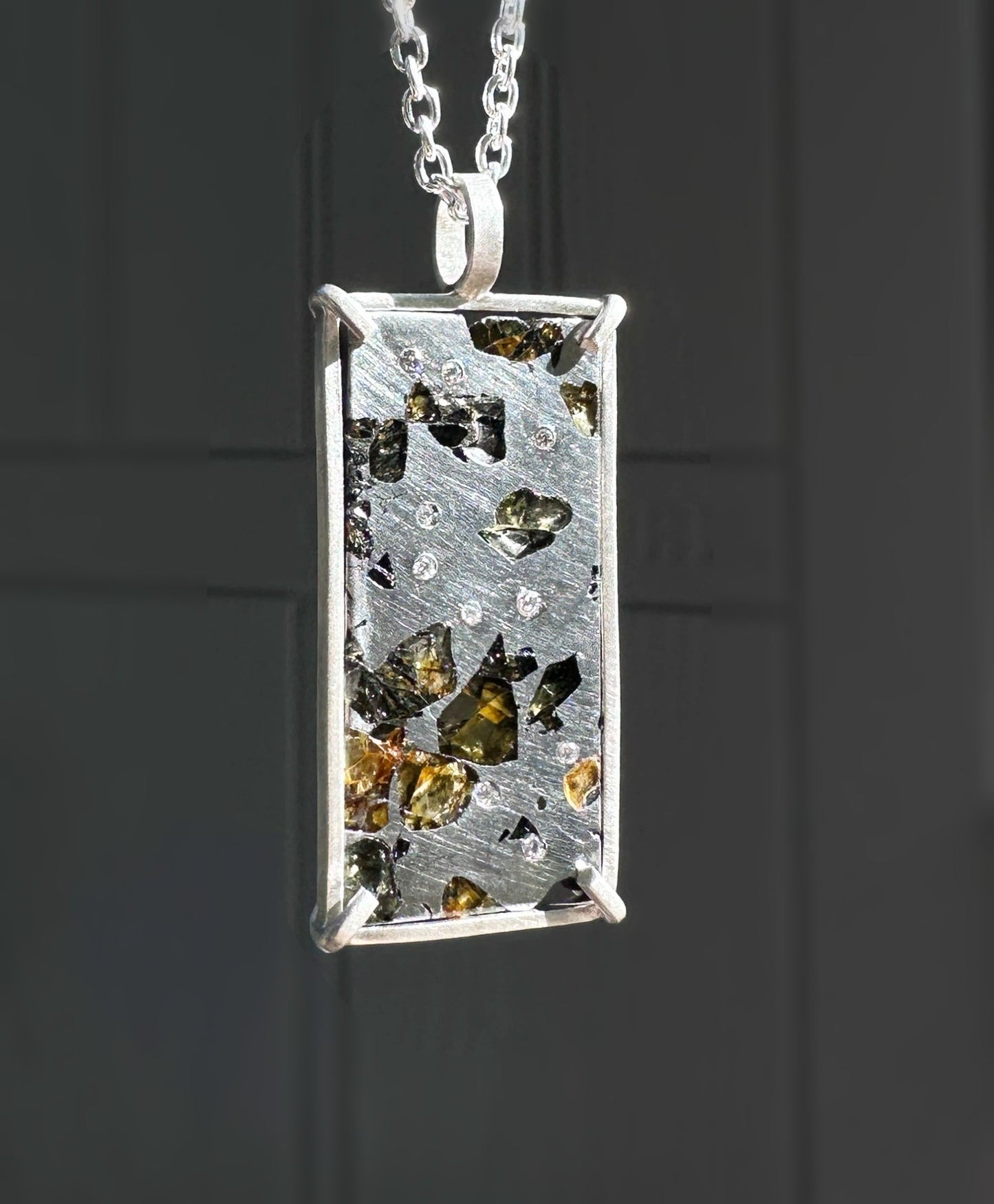 Pallasite meteorite pendant with diamond accents set in sterling silver Seymchan necklace