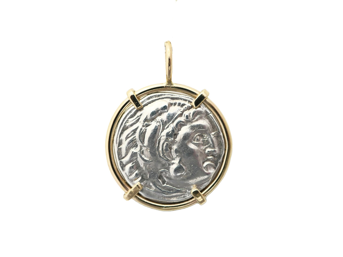 Ancient Greek silver coin pendant in 14k gold setting.