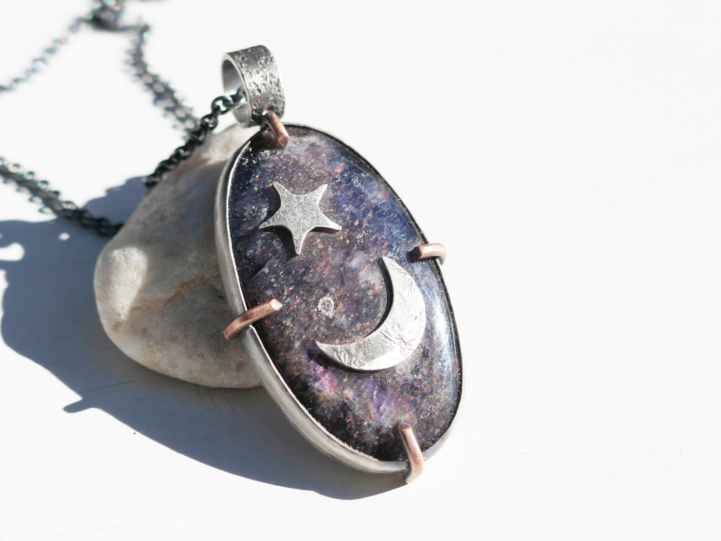 Galaxy Iolite Sunstone Pendant with purple oval gemstone, diamond, crescent moon, star, and solid sterling silver setting