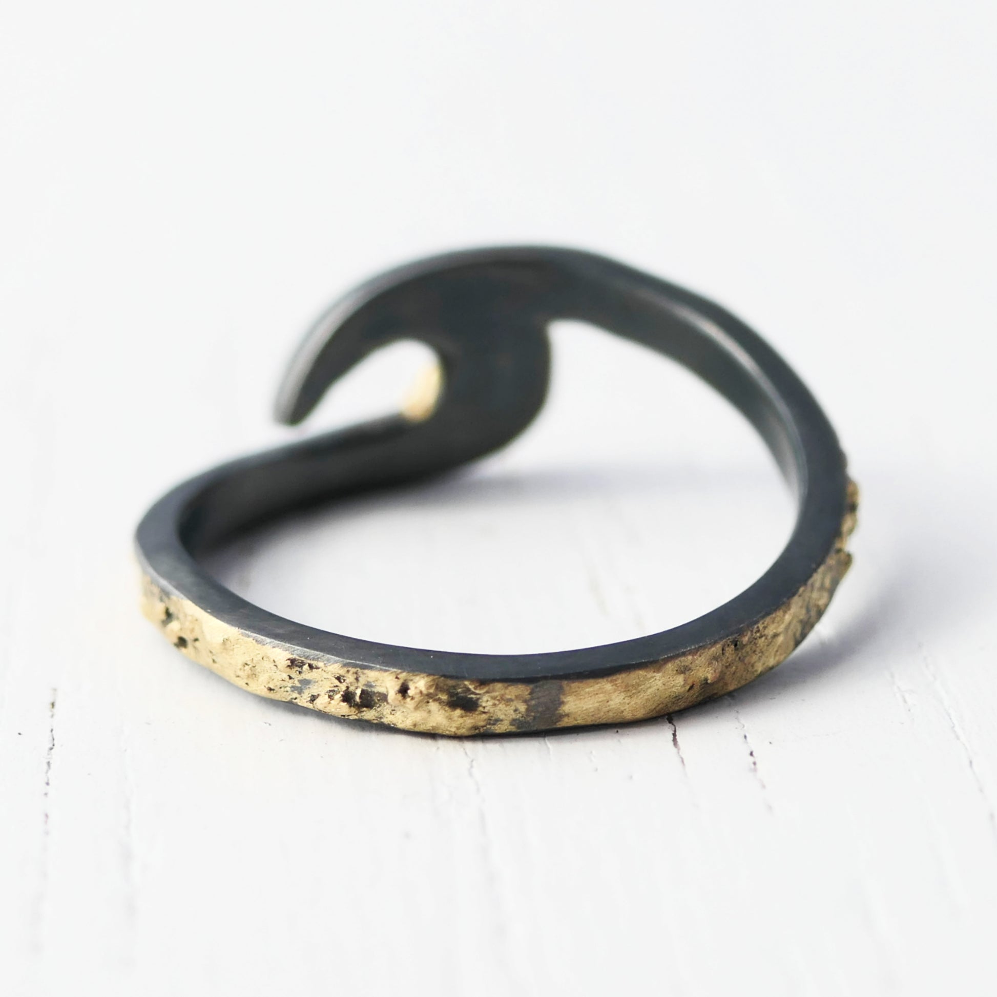 black silver gold wave ring