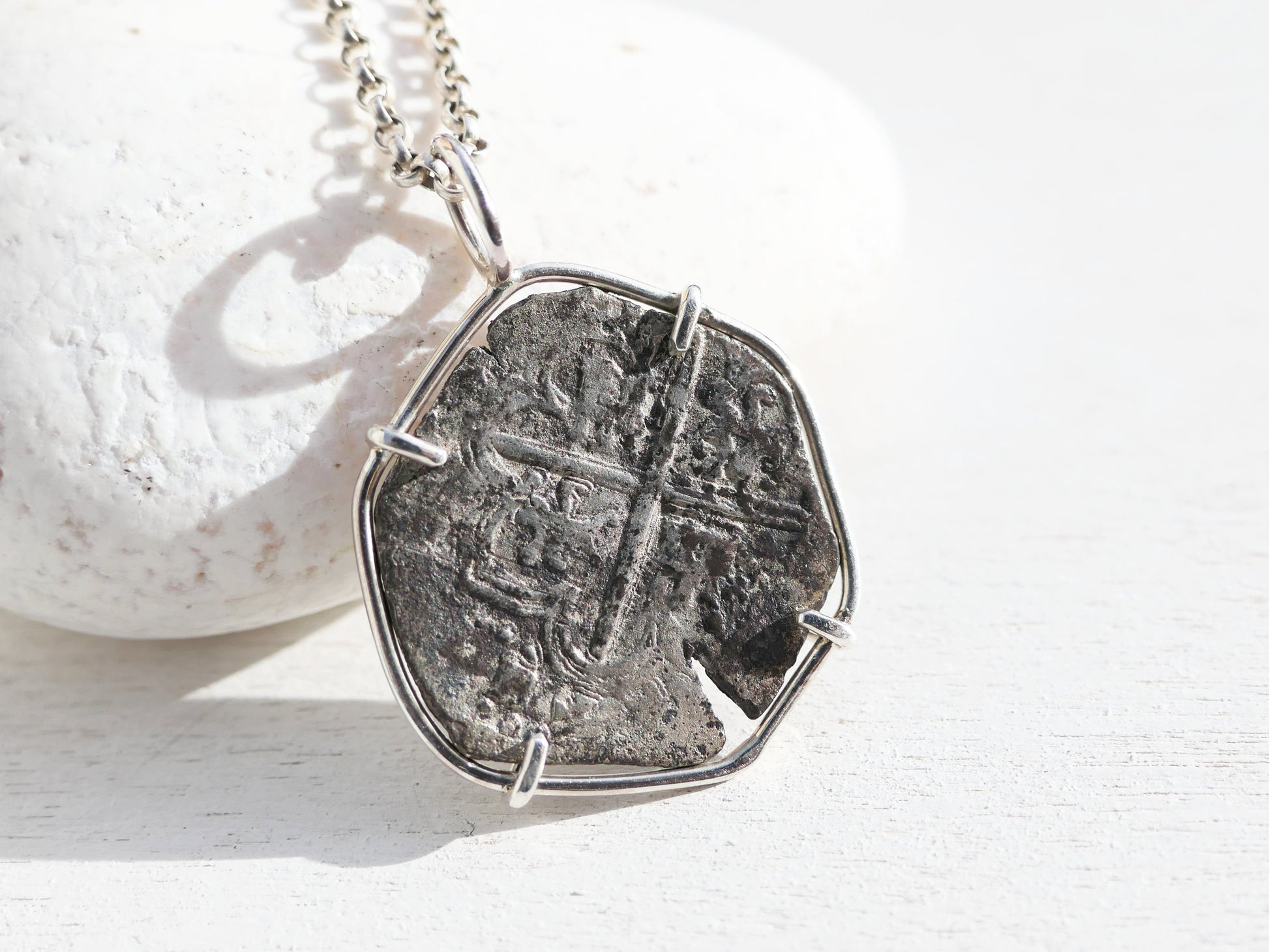 cob coin set in sterling silver