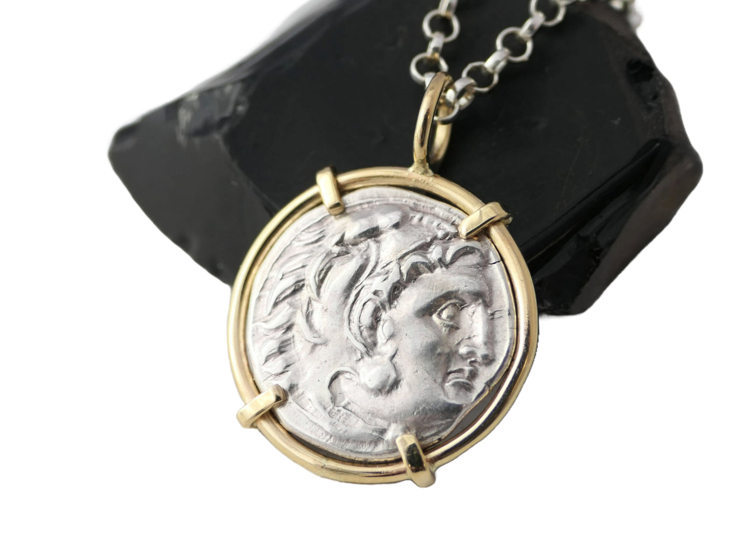 ancient silver coin set in 14k yellow gold