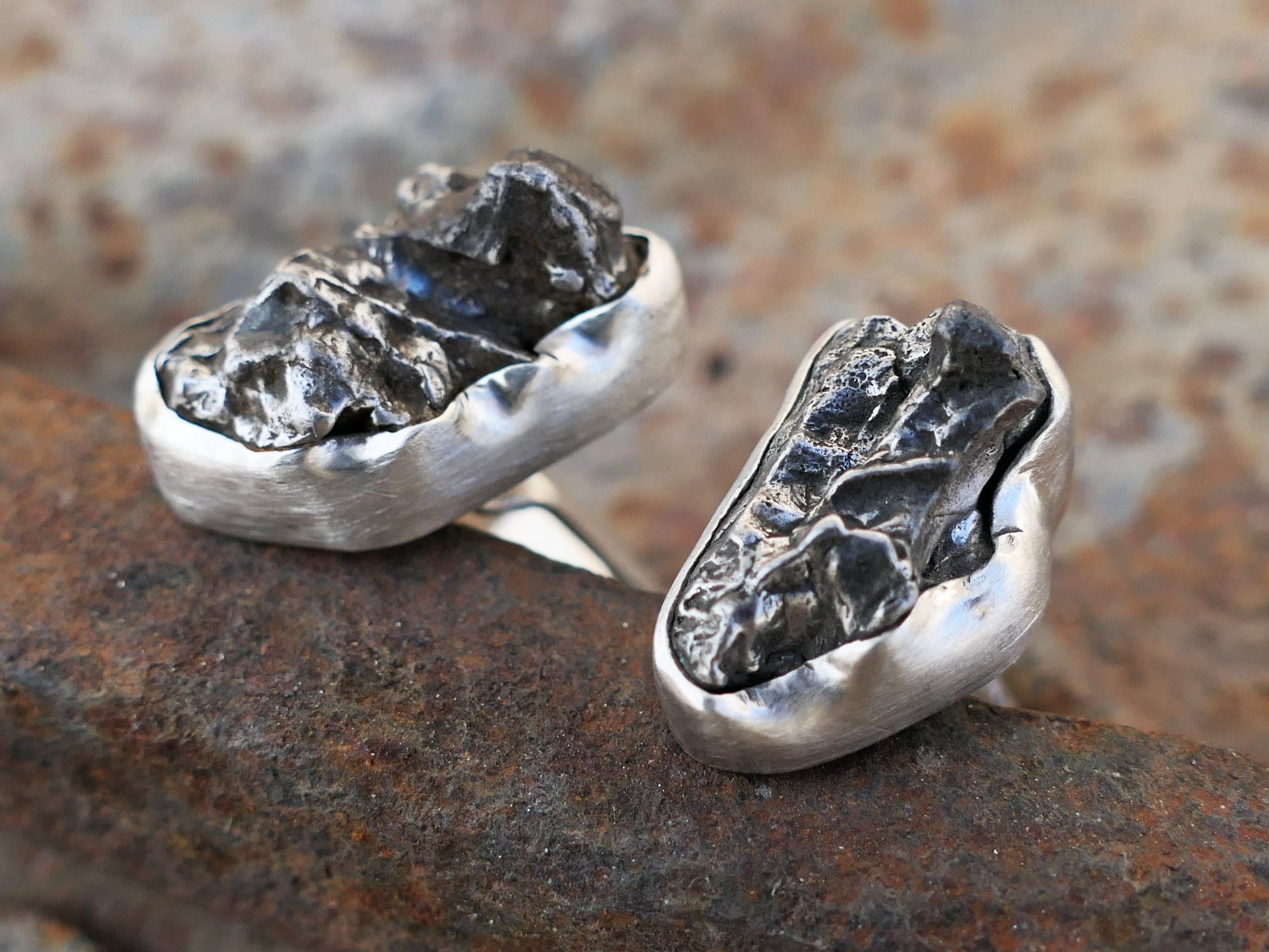 silver cuff links with meteorite