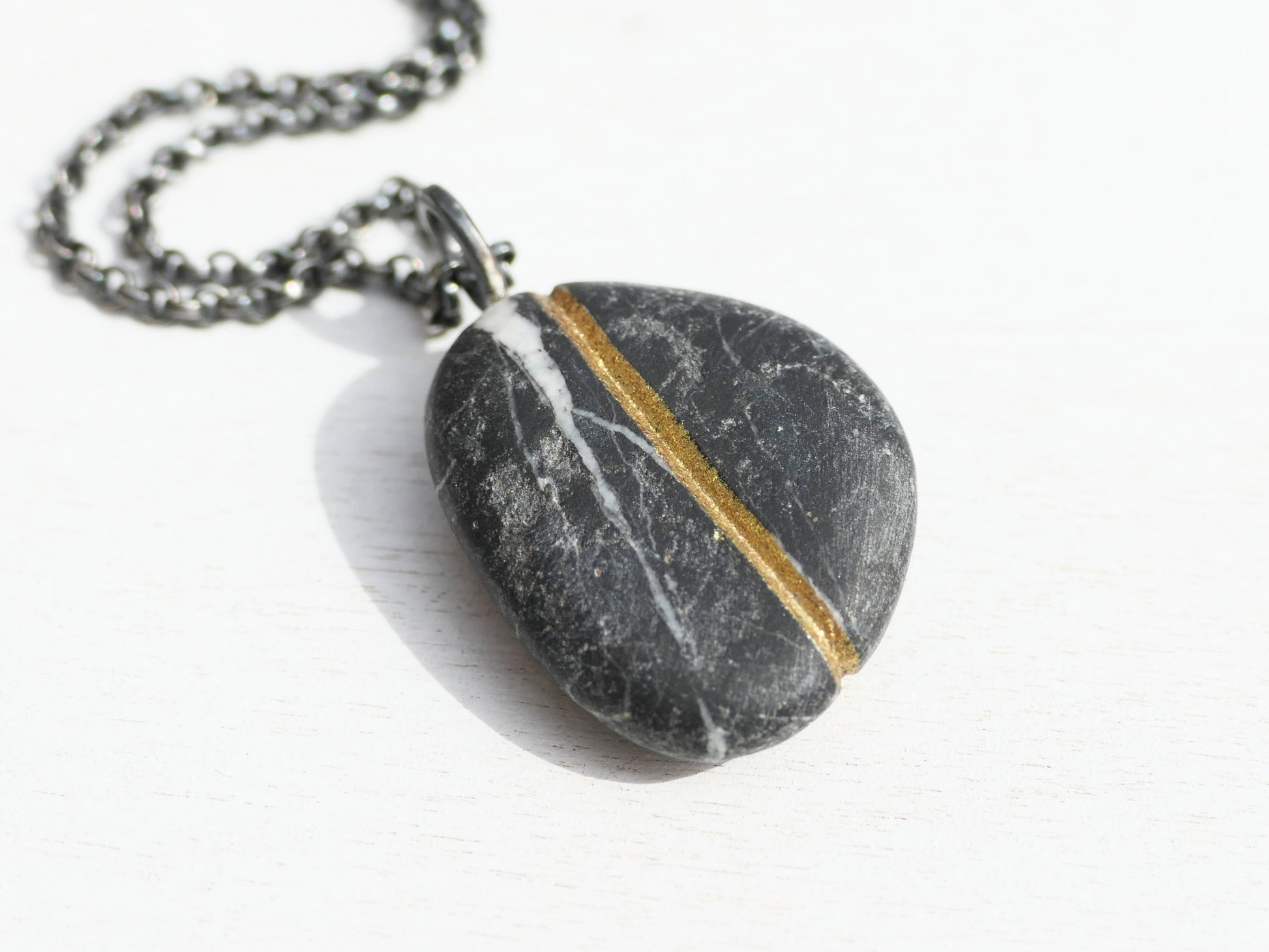 Gold River stone pendant