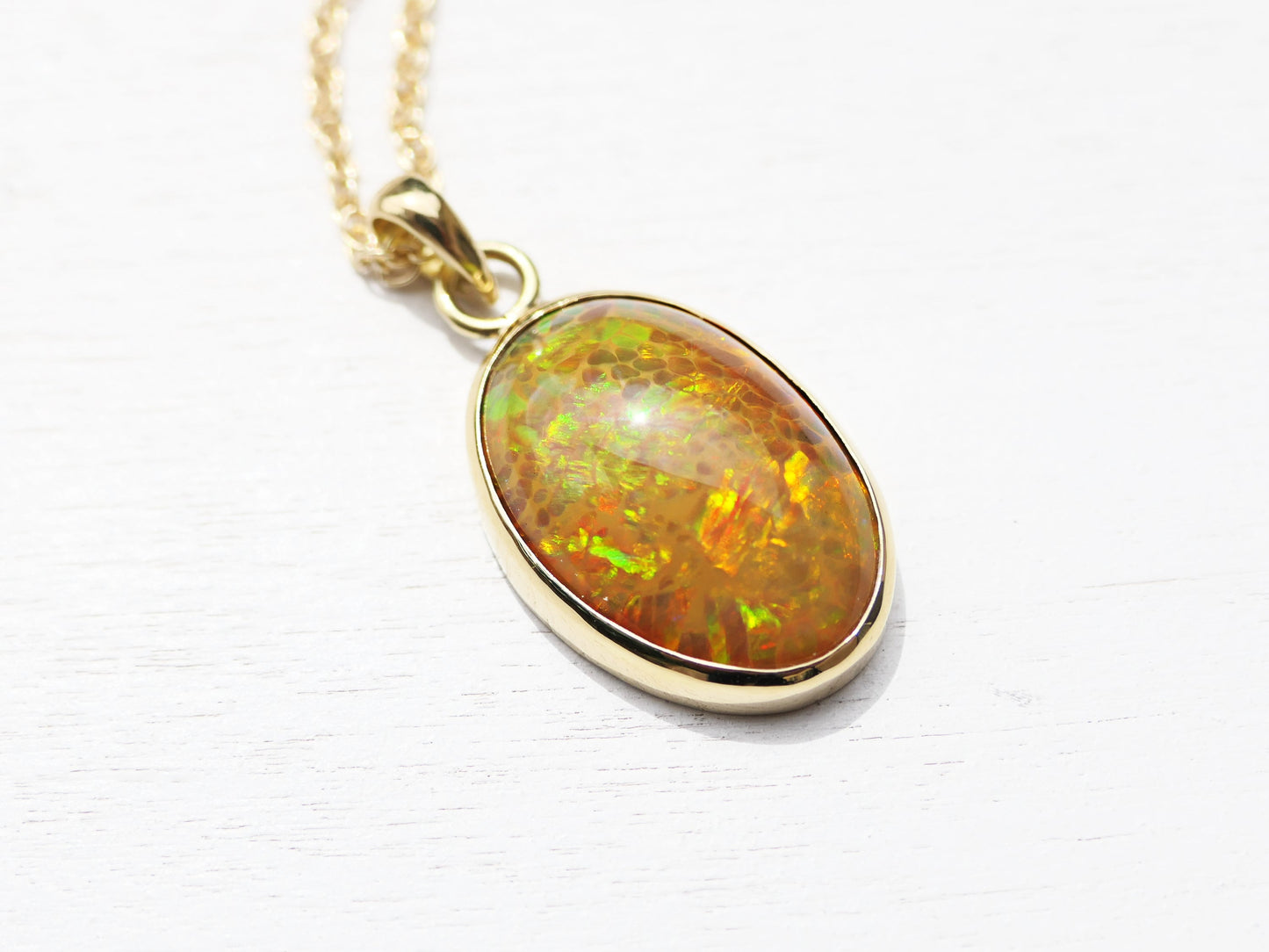 Genuine honeycomb welo opal charm necklace