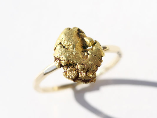 Hammered 14k gold nugget ring with natural gold nugget, customizable size.