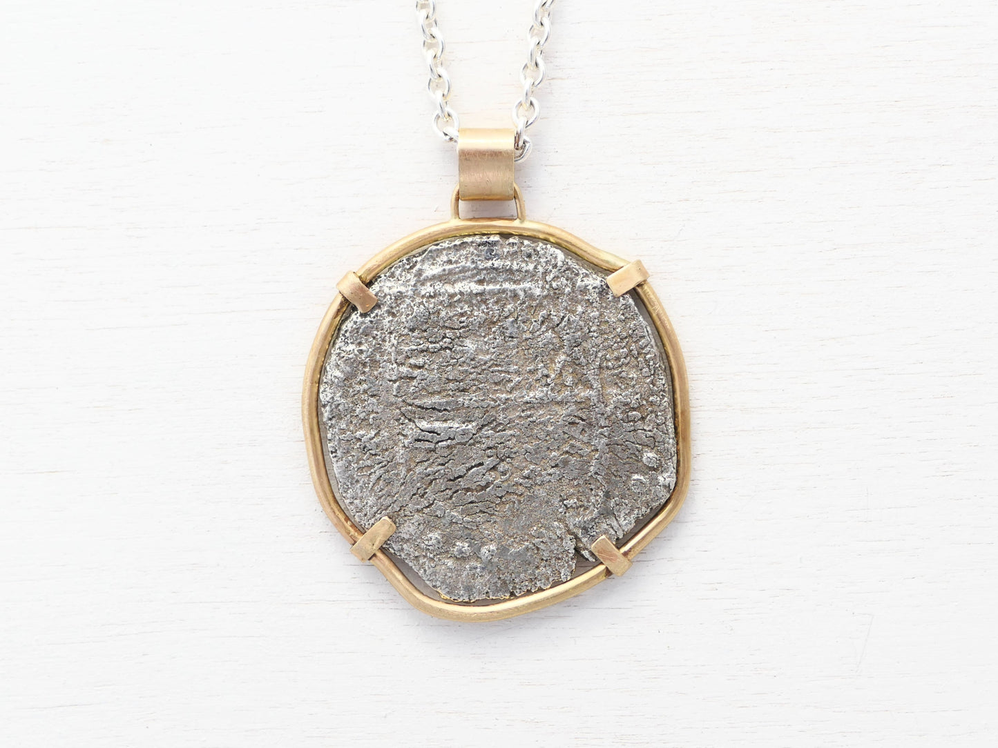 Atocha shipwreck coin set in solid 14k gold