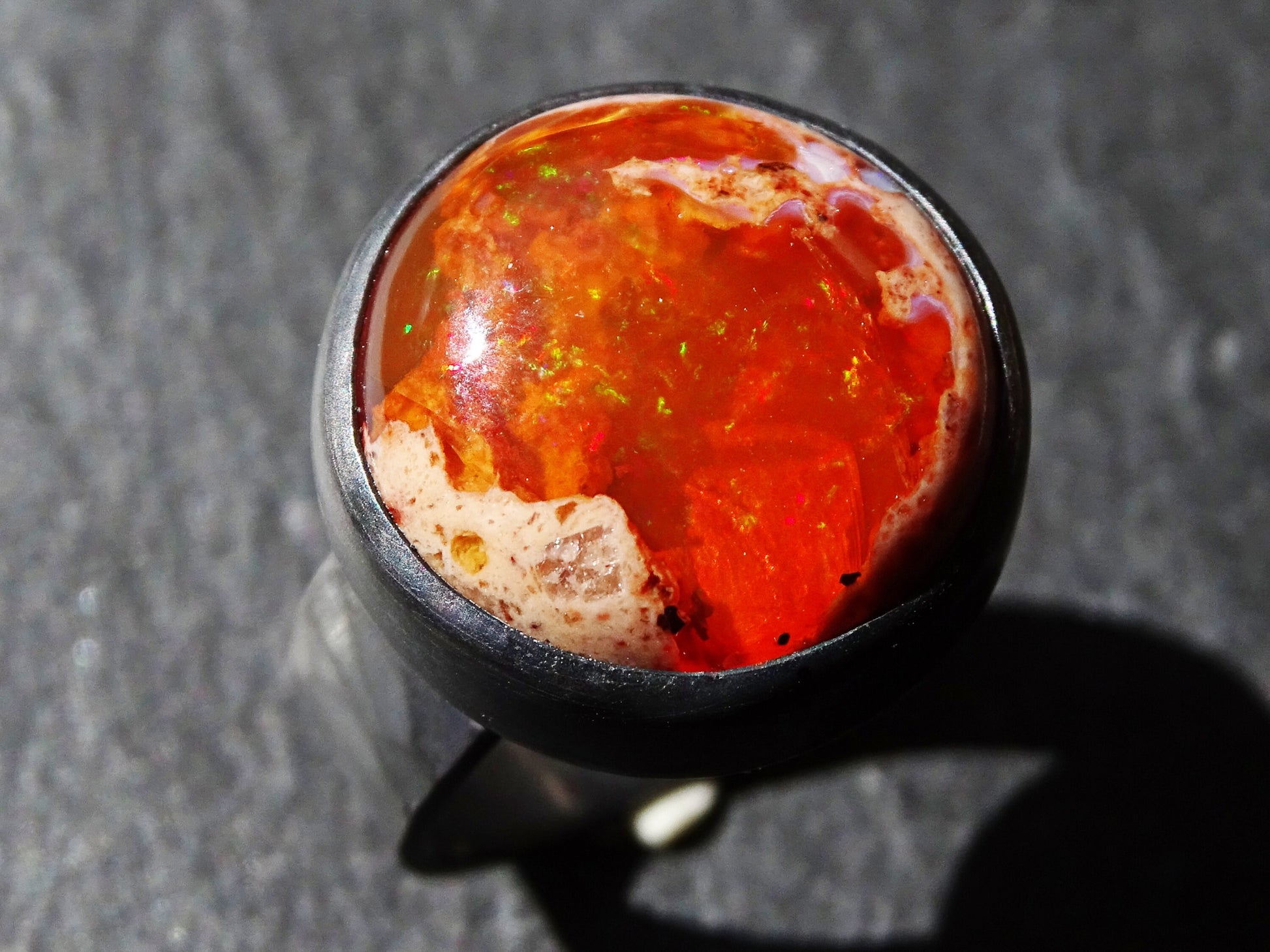 large orange fire opal ring in black silver, size US 7 1/4 - CrazyAss Jewelry Designs