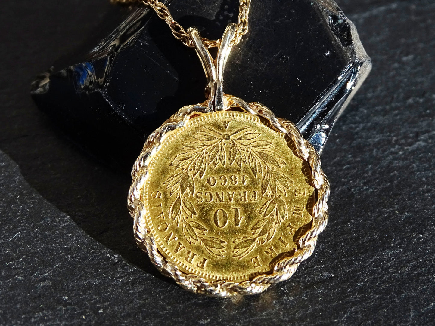 Authentic 1860 10 Francs gold coin pendant, set in solid 14k gold.Minimalist coin necklace, great for layering or also as a single piece. 
&gt; overall pendant hangi