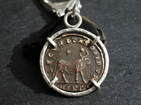 big silver key chain with ancient Roman Empire coin